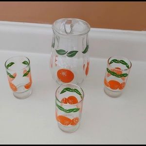 Super cute vintage orange pitcher set